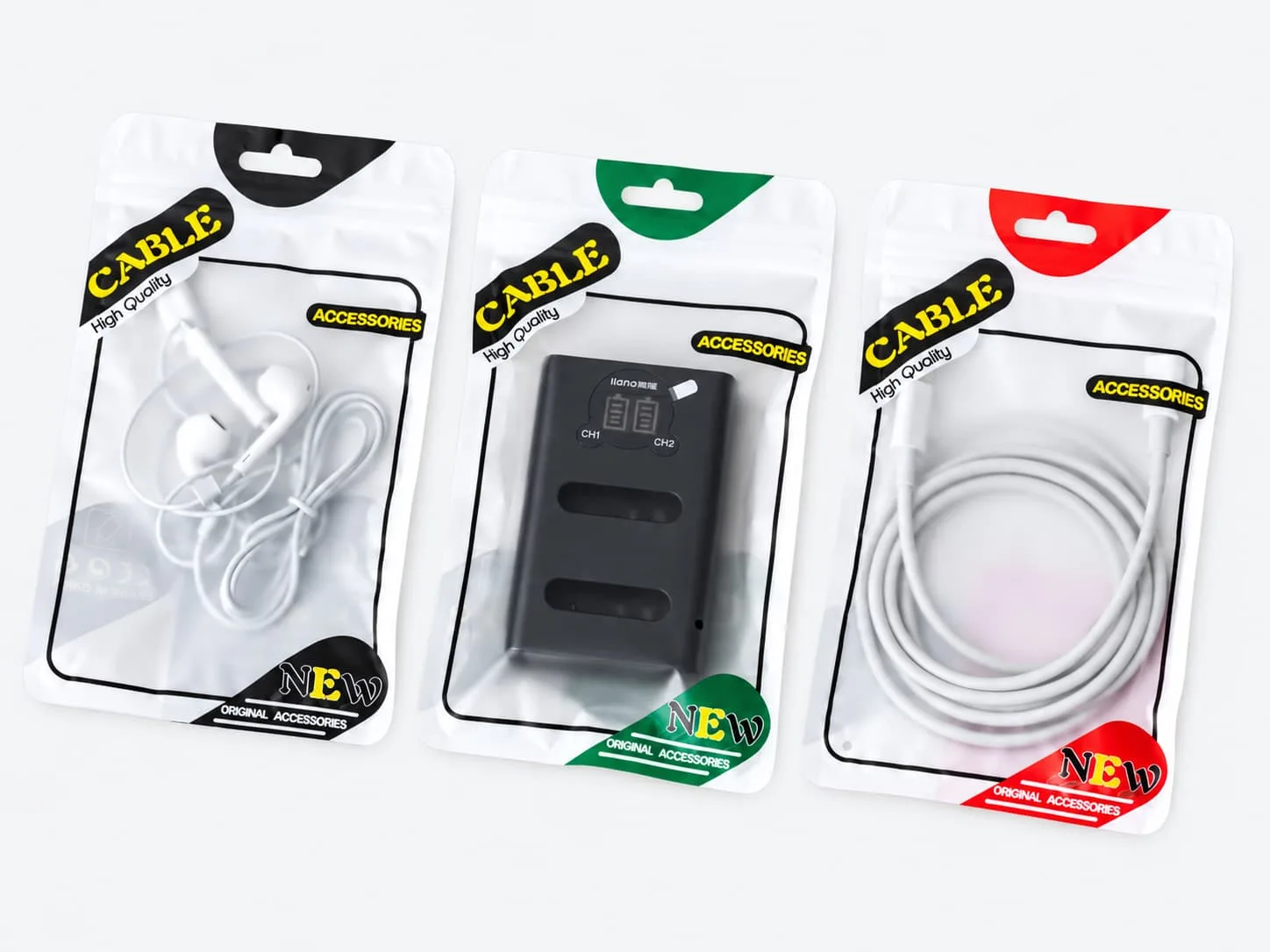 Translucent packaging pouches containing earphones, a battery charger and a cable on a light gray background.